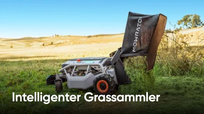Das Foto zeigt den Rasenmäher beim Aufsammeln des gemähten Grases mithilfe des Grasfangkorbes